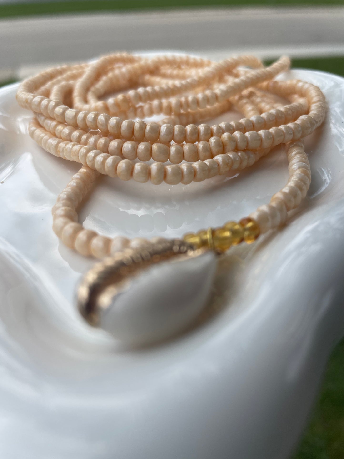 Cowrie shell charm waist beads.  Weight loss tracker cream colored traditional tie on belly beads