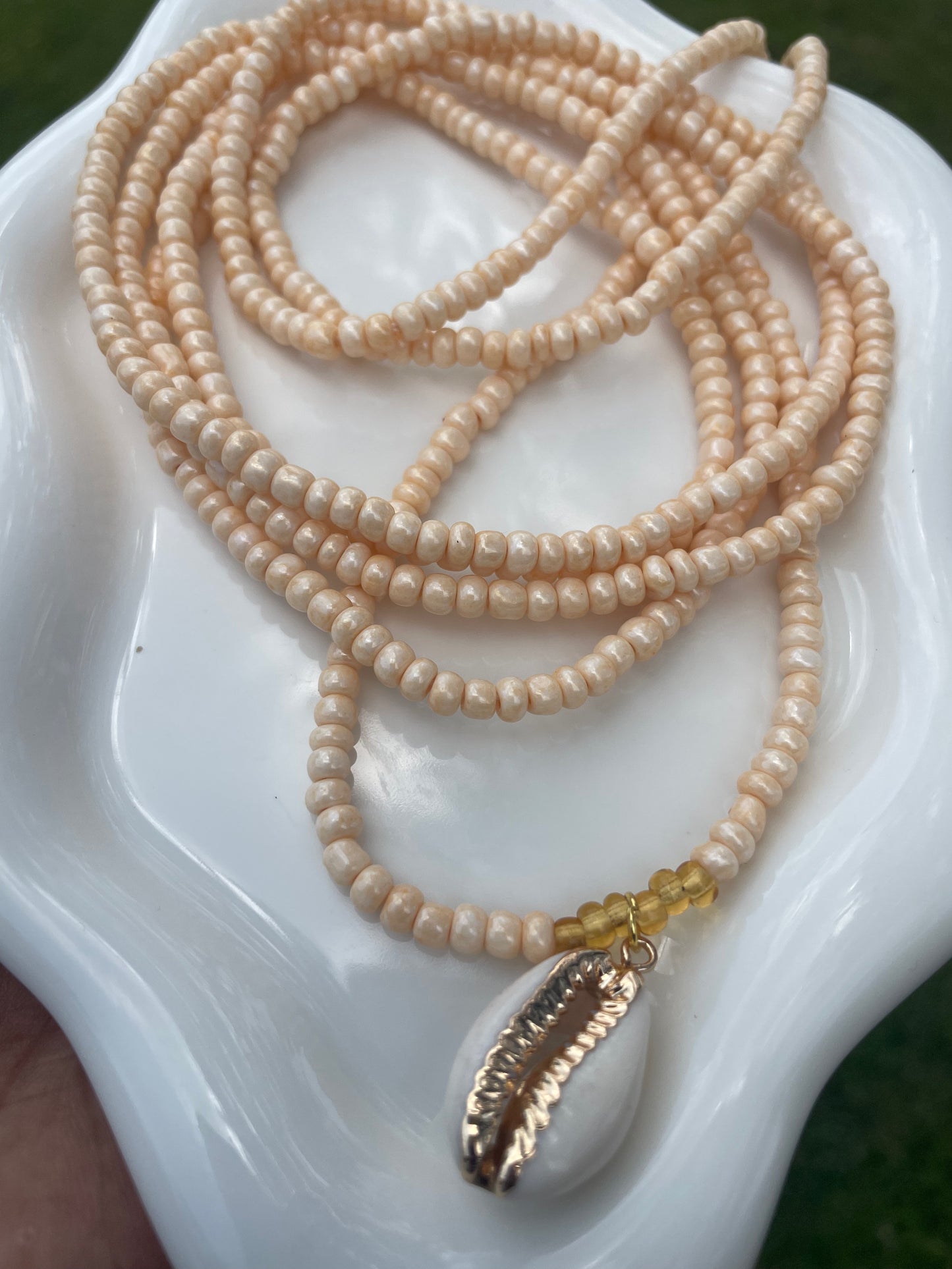 Cowrie shell charm waist beads.  Weight loss tracker cream colored traditional tie on belly beads