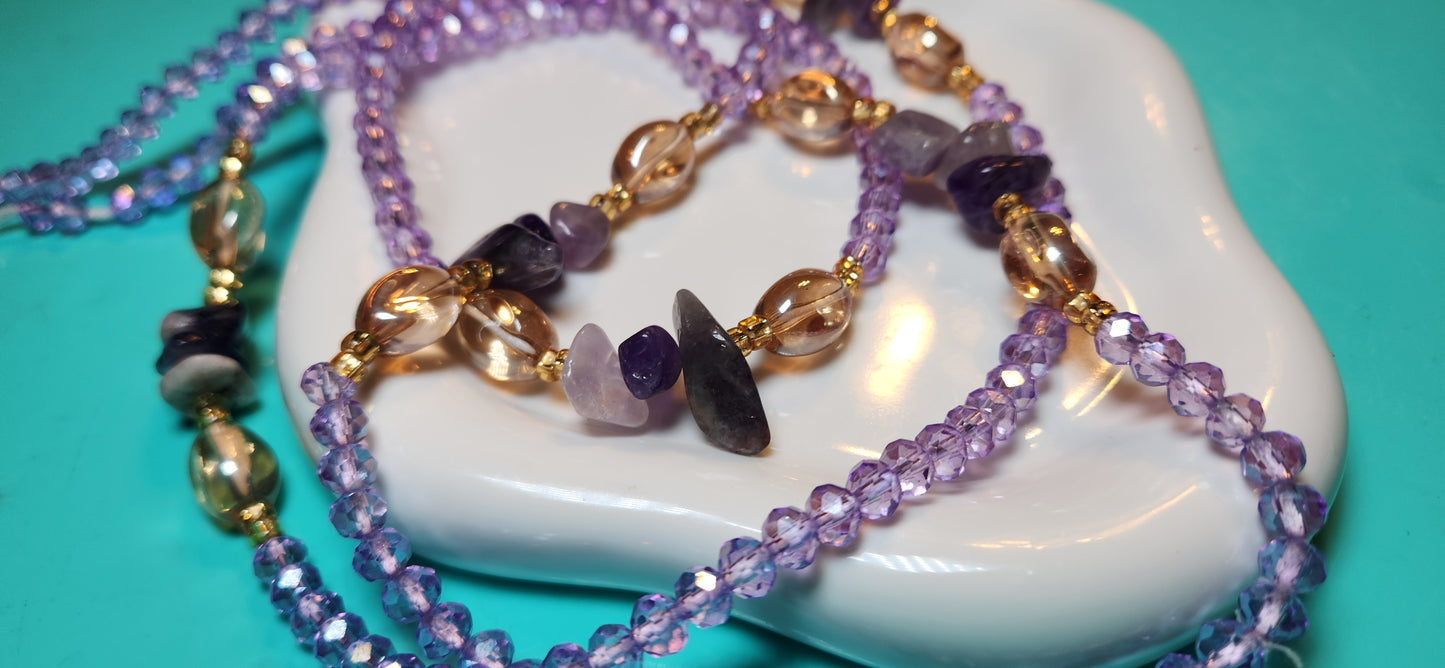 Sunstone Serenity is her name is it purple, : Incorporates the warm, translucent beads and a calming feel.